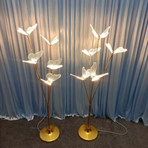 Butterfly Light Stand MLA101 — Illuminated butterfly forms on slender gold-tone stems.