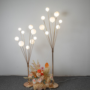 Globe Light Stand MLA103 — A branching arrangement of softly glowing globe lights.